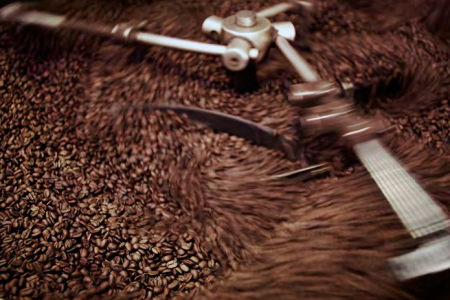 coffee mill stirring beans